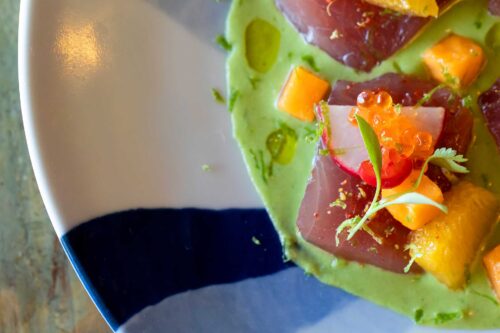 Edge District Casa Pearl OBX Yellowfin Tuna Crudo: Coconut-Lemongrass Emulsion, Sweet Potato, Orange, Pickled Fresno Chilis, Trout Caviar.